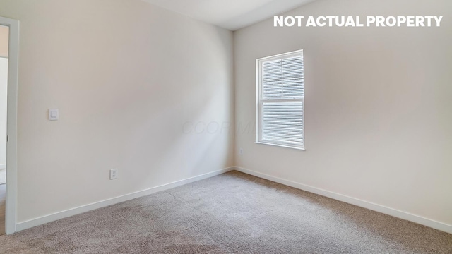 183 Badger Pass, Newark, OH 43055 - spare room featuring carpet and baseboards