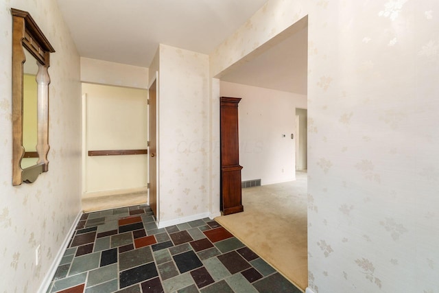 893 Singing Hills Ln, Columbus, OH 43235 - corridor with wallpapered walls