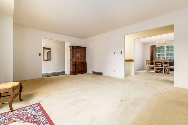 893 Singing Hills Ln, Columbus, OH 43235 - living area with a chandelier and carpet