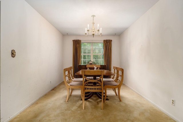 893 Singing Hills Ln, Columbus, OH 43235 - dining area featuring a chandelier and carpet flooring