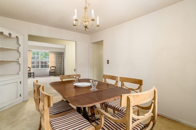 893 Singing Hills Ln, Columbus, OH 43235 - dining space featuring light carpet and a chandelier