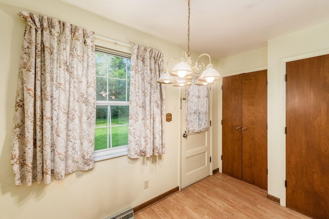 893 Singing Hills Ln, Columbus, OH 43235 - foyer entrance featuring a chandelier and wood finished floors