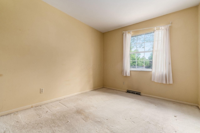 893 Singing Hills Ln, Columbus, OH 43235 - carpeted empty room featuring baseboards and lofted ceiling