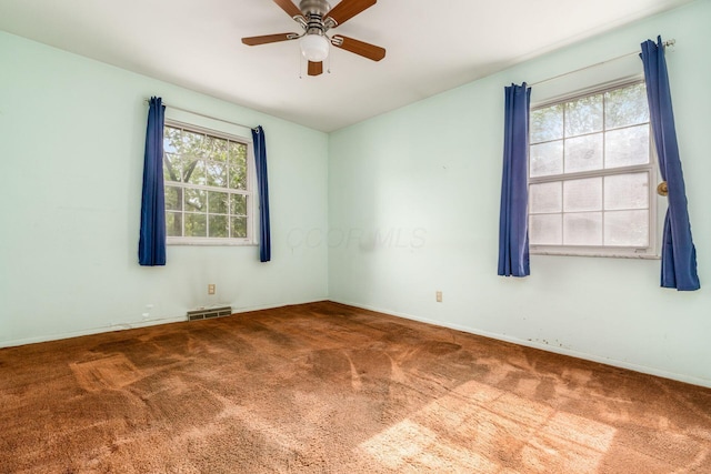893 Singing Hills Ln, Columbus, OH 43235 - spare room with carpet flooring and a ceiling fan
