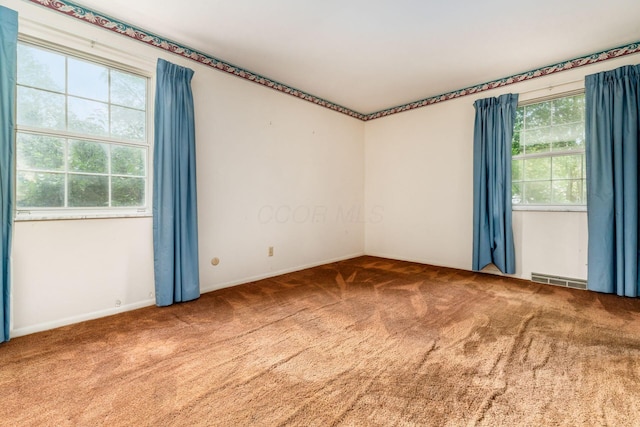 893 Singing Hills Ln, Columbus, OH 43235 - carpeted empty room with plenty of natural light
