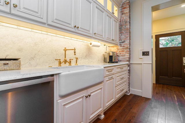 33 E Frankfort St, Columbus, OH 43206 - kitchen featuring tasteful backsplash, light stone countertops, glass insert cabinets, dark wood-type flooring, and stainless steel dishwasher