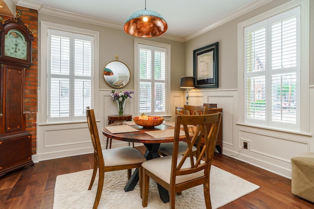 33 E Frankfort St, Columbus, OH 43206 - dining area featuring a decorative wall, healthy amount of natural light, wood finished floors, ornamental molding, and wainscoting