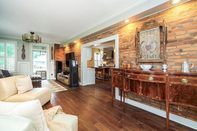 33 E Frankfort St, Columbus, OH 43206 - living room with crown molding, wood finished floors, a decorative wall, and a wainscoted wall