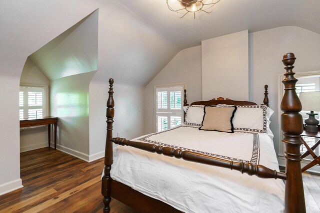 33 E Frankfort St, Columbus, OH 43206 - bedroom featuring lofted ceiling and wood-type flooring