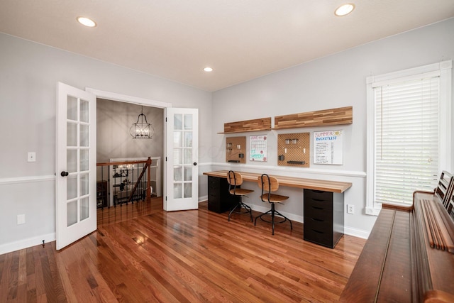 8918 Filiz Ln, Powell, OH 43065 - office area featuring french doors, wood finished floors, recessed lighting, and a chandelier