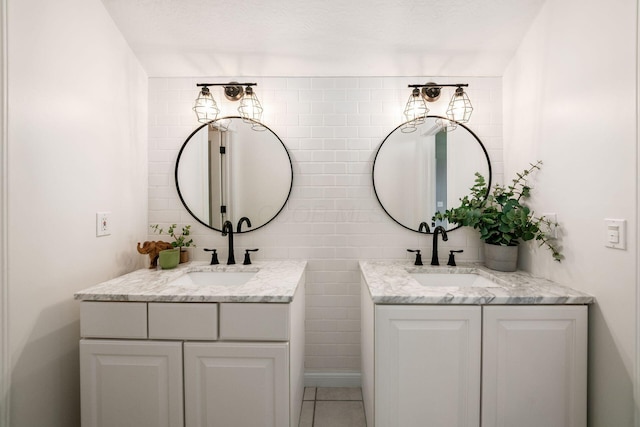 8918 Filiz Ln, Powell, OH 43065 - full bathroom featuring two vanities and tile patterned flooring