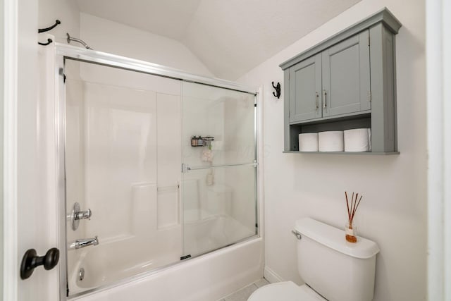 8918 Filiz Ln, Powell, OH 43065 - full bathroom featuring lofted ceiling, enclosed tub / shower combo, and tile patterned flooring