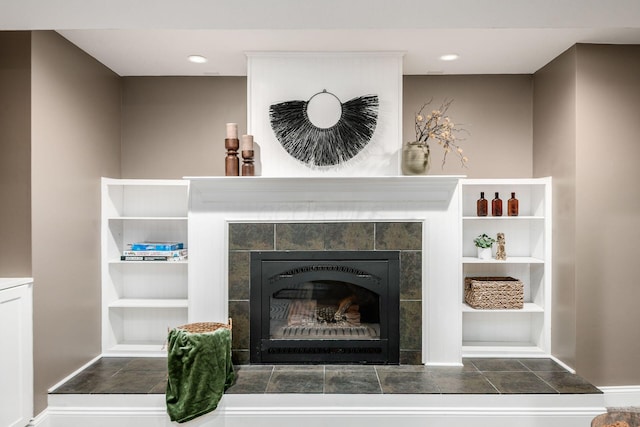 8918 Filiz Ln, Powell, OH 43065 - detailed view of a tiled fireplace and built in features