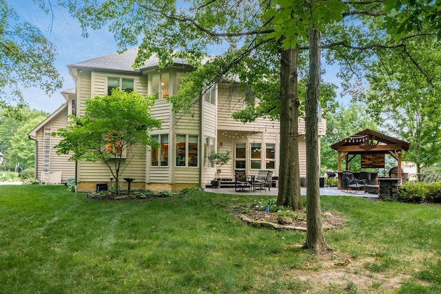 8918 Filiz Ln, Powell, OH 43065 - rear view of house featuring a gazebo, a yard, and a patio