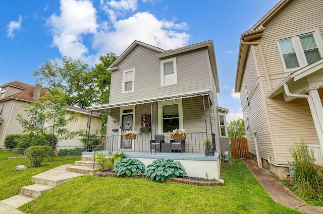 573 E Mithoff St, Columbus, OH 43206 - view of front facade with a porch