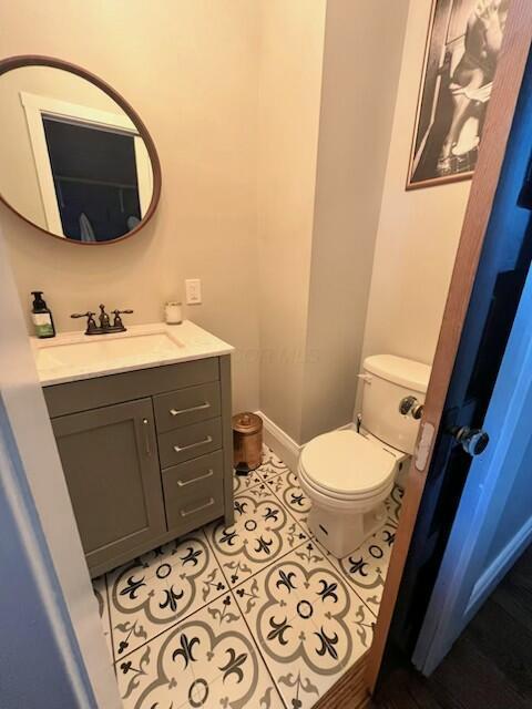 573 E Mithoff St, Columbus, OH 43206 - bathroom with vanity and tile patterned flooring