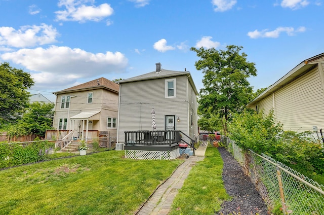 573 E Mithoff St, Columbus, OH 43206 - rear view of house with a fenced backyard and a deck