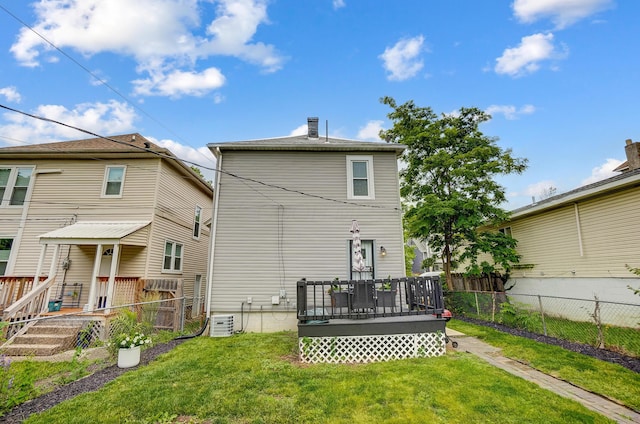 573 E Mithoff St, Columbus, OH 43206 - back of house with a fenced backyard and a deck