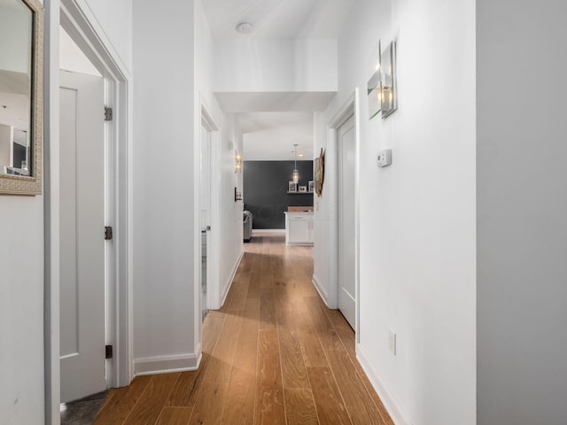 825 N 4th St Unit 215, Columbus, OH 43215 - hallway with wood finished floors and baseboards