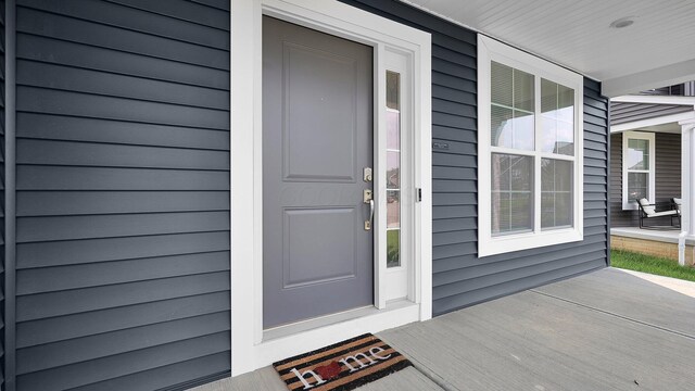 8145 Rhoderick Cir, Reynoldsburg, OH 43068 - view of exterior entry featuring covered porch