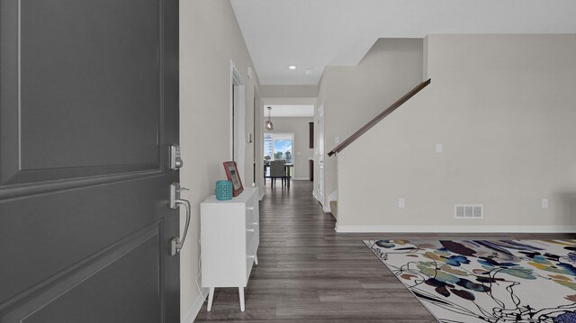 8145 Rhoderick Cir, Reynoldsburg, OH 43068 - entryway with dark wood finished floors and recessed lighting
