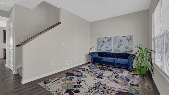 8145 Rhoderick Cir, Reynoldsburg, OH 43068 - sitting room with stairway and dark wood-style flooring