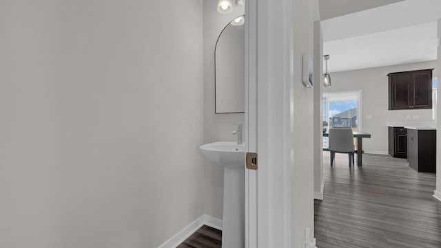 8145 Rhoderick Cir, Reynoldsburg, OH 43068 - bathroom featuring baseboards and wood finished floors