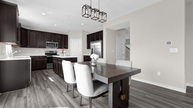 8145 Rhoderick Cir, Reynoldsburg, OH 43068 - dining room with dark wood-style floors and recessed lighting