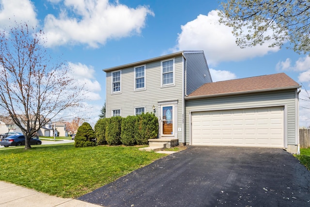 5722 Silver Spurs Ln, Galloway, OH 43119 - view of front of home with driveway, a front lawn, and an attached garage