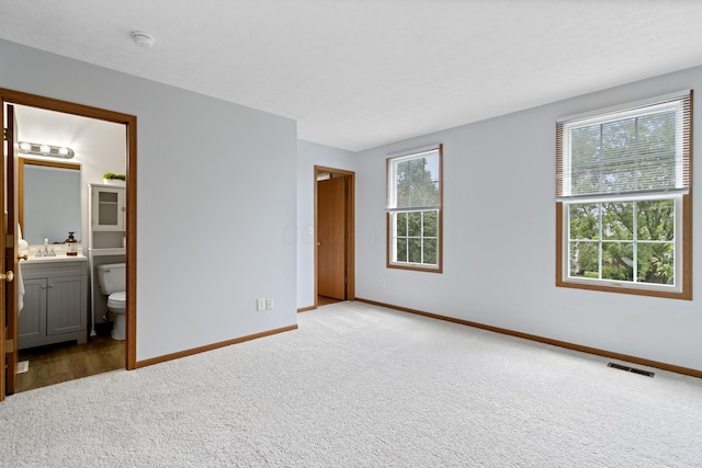 5722 Silver Spurs Ln, Galloway, OH 43119 - unfurnished bedroom featuring carpet and ensuite bath