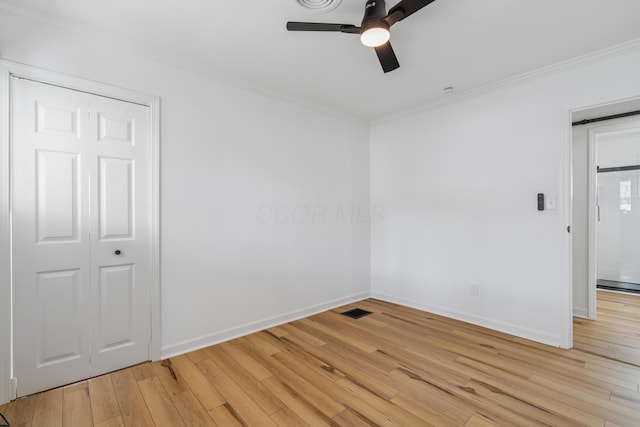 2554 Nottingham Rd, Upper Arlington, OH 43221 - spare room featuring crown molding, ceiling fan, and light wood-type flooring