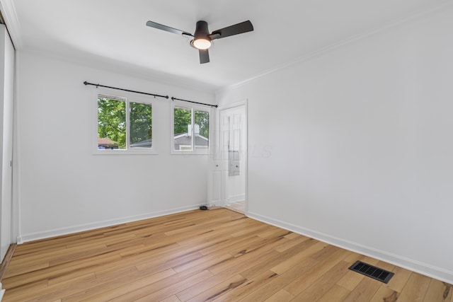 2554 Nottingham Rd, Upper Arlington, OH 43221 - spare room featuring ornamental molding, light wood-type flooring, and a ceiling fan