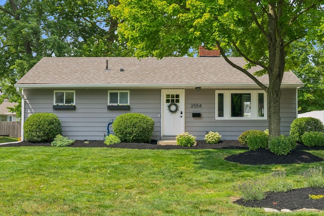 2554 Nottingham Rd, Upper Arlington, OH 43221 - view of front facade featuring a chimney and a shingled roof