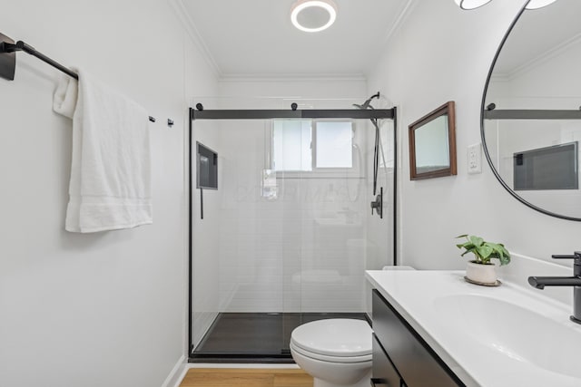 2554 Nottingham Rd, Upper Arlington, OH 43221 - bathroom with a stall shower, vanity, ornamental molding, and wood finished floors
