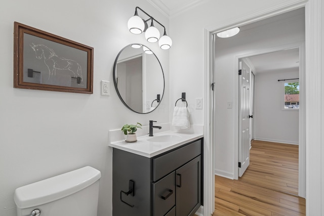 2554 Nottingham Rd, Upper Arlington, OH 43221 - half bath with vanity, wood finished floors, and crown molding