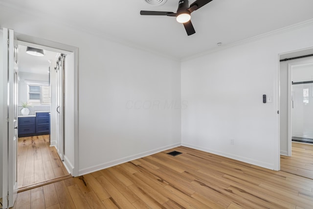 2554 Nottingham Rd, Upper Arlington, OH 43221 - empty room with a ceiling fan, crown molding, and light wood-type flooring