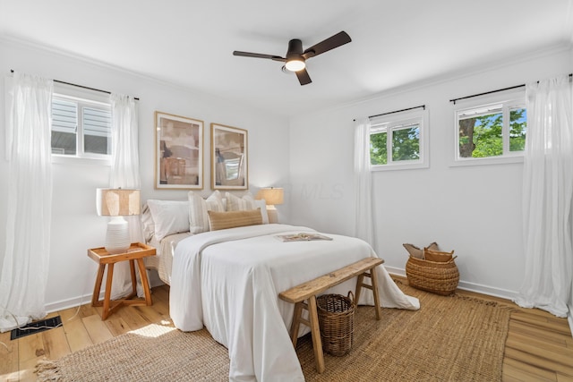 2554 Nottingham Rd, Upper Arlington, OH 43221 - bedroom featuring light wood finished floors, crown molding, and a ceiling fan