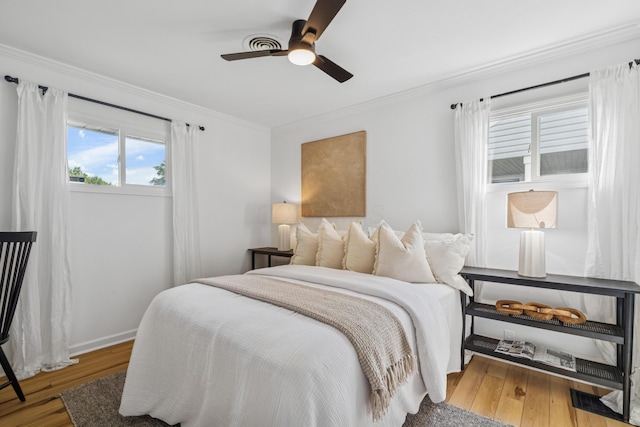 2554 Nottingham Rd, Upper Arlington, OH 43221 - bedroom featuring ornamental molding, wood finished floors, and a ceiling fan
