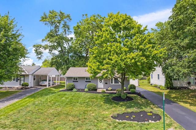 2554 Nottingham Rd, Upper Arlington, OH 43221 - view of front facade featuring a front lawn and asphalt driveway