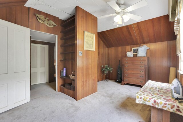 2083 Welsh Hills Rd, Granville, OH 43023 - bedroom with wood walls, carpet, vaulted ceiling, and ceiling fan