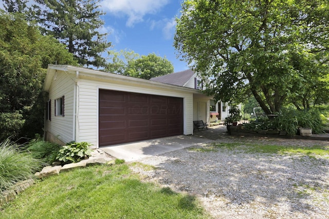 2083 Welsh Hills Rd, Granville, OH 43023 - view of front of property with an attached garage and gravel driveway