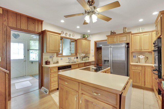 2083 Welsh Hills Rd, Granville, OH 43023 - kitchen featuring black appliances, a center island, light countertops, ceiling fan, and recessed lighting