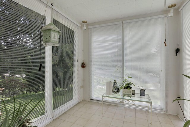 2083 Welsh Hills Rd, Granville, OH 43023 - unfurnished sunroom featuring tile patterned flooring