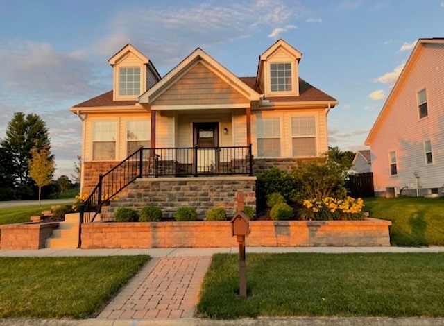 332 Bottecchia Blvd, Johnstown, OH 43031 - view of front of house featuring a porch, a front lawn, and stairs