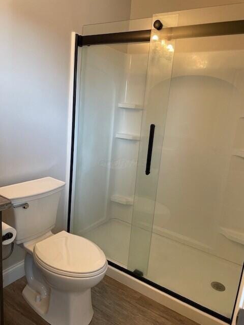 332 Bottecchia Blvd, Johnstown, OH 43031 - full bathroom featuring wood finished floors and a stall shower