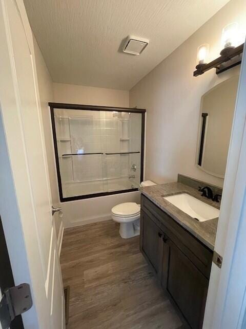 332 Bottecchia Blvd, Johnstown, OH 43031 - full bath featuring vanity, wood finished floors, shower / bath combination, and a textured ceiling