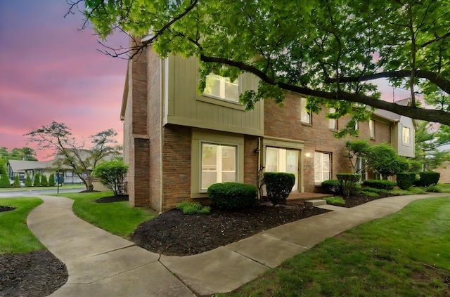 1757 Connors Point Dr, Columbus, OH 43220 - view of front facade featuring brick siding and a front lawn
