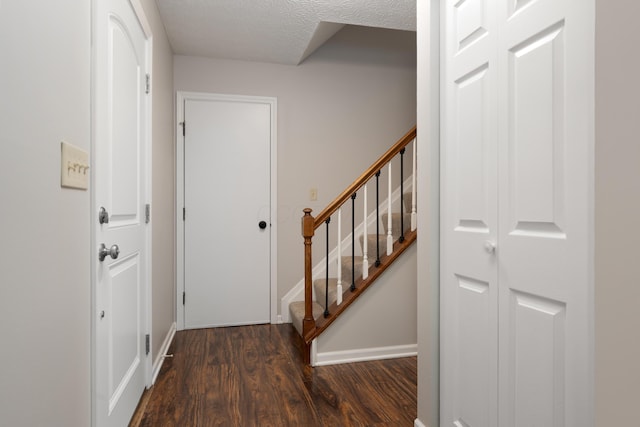 2268 Worthingwoods Blvd, Powell, OH 43065 - foyer entrance featuring wood finished floors, a textured ceiling, and stairway