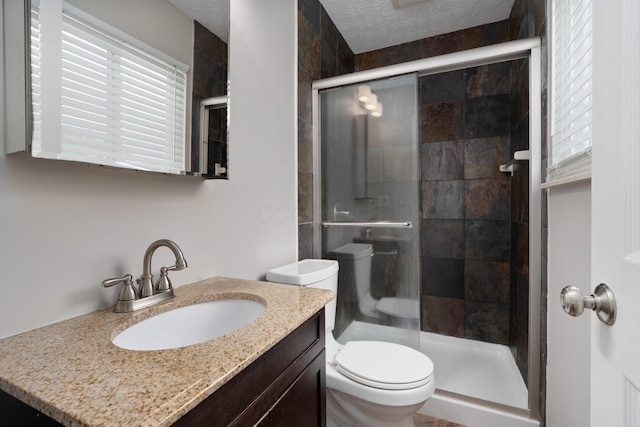 2268 Worthingwoods Blvd, Powell, OH 43065 - bathroom with a stall shower, vanity, and a textured ceiling