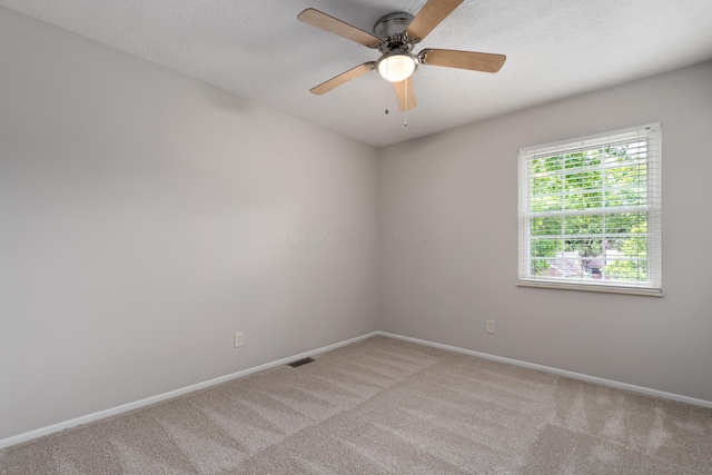 2268 Worthingwoods Blvd, Powell, OH 43065 - empty room with light colored carpet, ceiling fan, and a textured ceiling